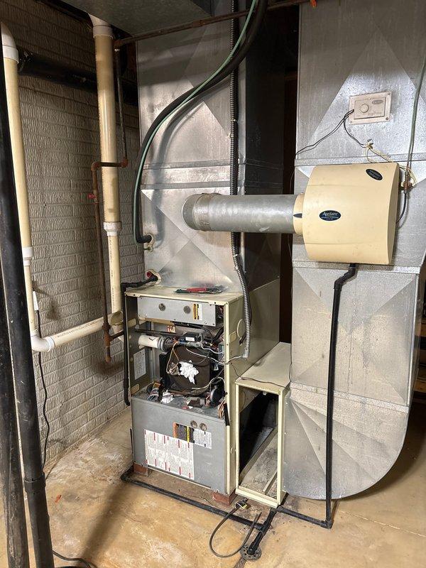 Successfully completed installation of a 90% efficiency furnace with air conditioning system in the basement utility area, including proper mounting of all components, connection of ductwork, PVC ventilation, and electrical wiring. Verified system operation and installed a Kidde carbon monoxide detector to ensure safety compliance.