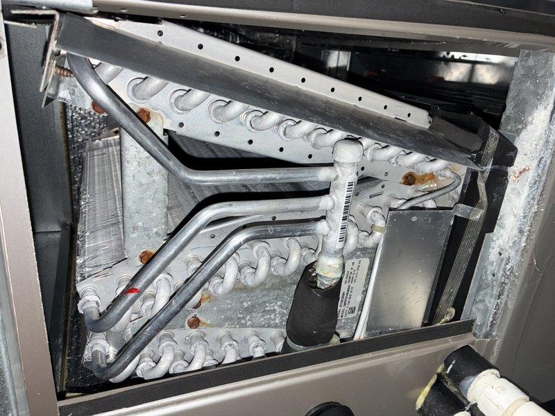 Performed scheduled preventative maintenance on residential heating system. Inspected furnace, ductwork, and associated components including humidifier. Examined evaporator coils which showed minor corrosion and accumulated dust; cleaned system components to ensure optimal performance for the heating season.