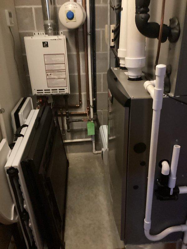 Performed scheduled MVP heating maintenance service on 2-year-old system. Inspected furnace, tankless water heater, and Aprilaire whole-home humidifier. All components functioning properly with no issues identified; system is operating at optimal performance levels.