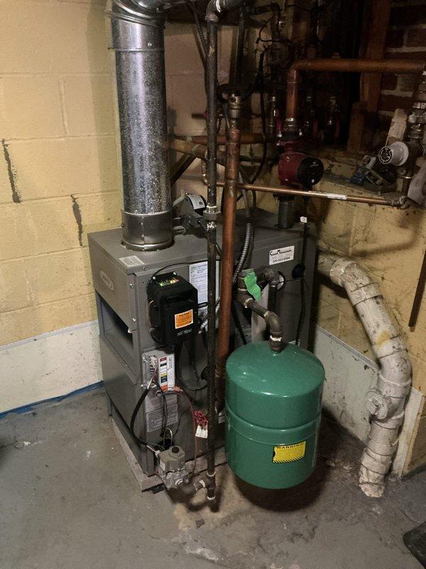 Responded to service call for non-functioning tanked water heater. Upon inspection of the basement mechanical system, diagnosed and replaced faulty components on the unit, including the expansion tank. Also serviced shower valve fixture to ensure proper water flow and temperature control throughout the home's plumbing system.