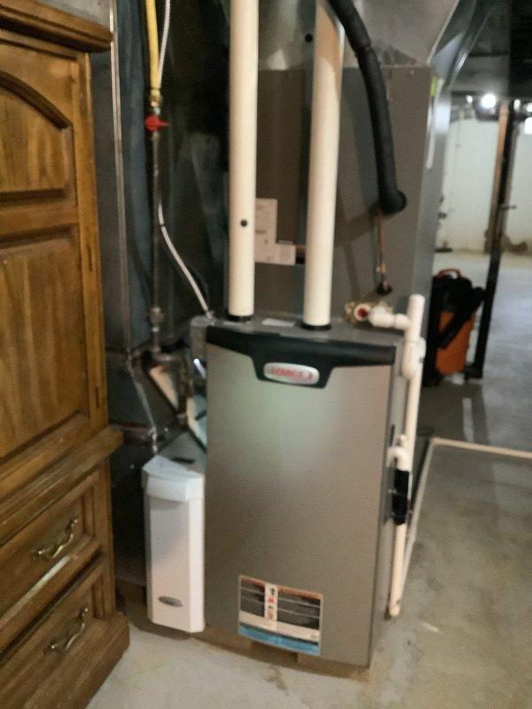 Performed routine maintenance on Lennox HVAC system with AprilAire integration. Inspected and serviced both heating and cooling components, including verification of proper venting through PVC pipes and evaluation of ductwork connections. System appears to be functioning as designed with no immediate concerns identified during the tune-up service.