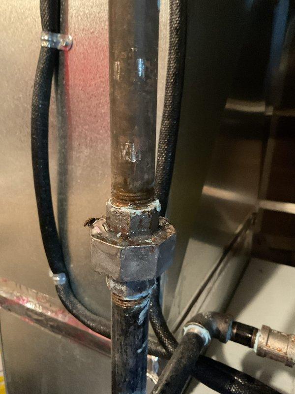 Performed annual maintenance on one-year-old gas furnace system and diagnosed non-functioning humidifier. Inspected plumbing connections showing signs of corrosion at pipe junctions and identified issue with humidifier causing excessive dryness in home. Completed service under MVP program.