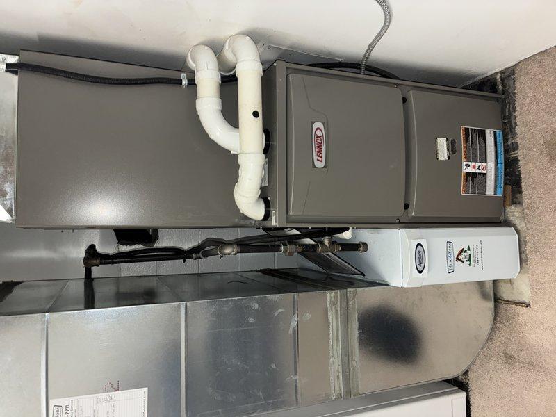 Performed routine maintenance service on 3-year-old Lennox gas furnace system. Inspected all components including ventilation PVC pipes, ductwork, and shut-off valve assembly. Unit and associated plumbing connections were found in good working condition with no visible issues requiring repair.