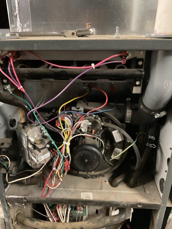 Completed scheduled furnace tune-up on 1-year-old unit as requested. Performed comprehensive inspection of electrical components, including circuit board connections and wiring harness integrity. Cleaned minor dust accumulation from interior housing and verified proper operation of blower motor assembly and gas valve functionality.