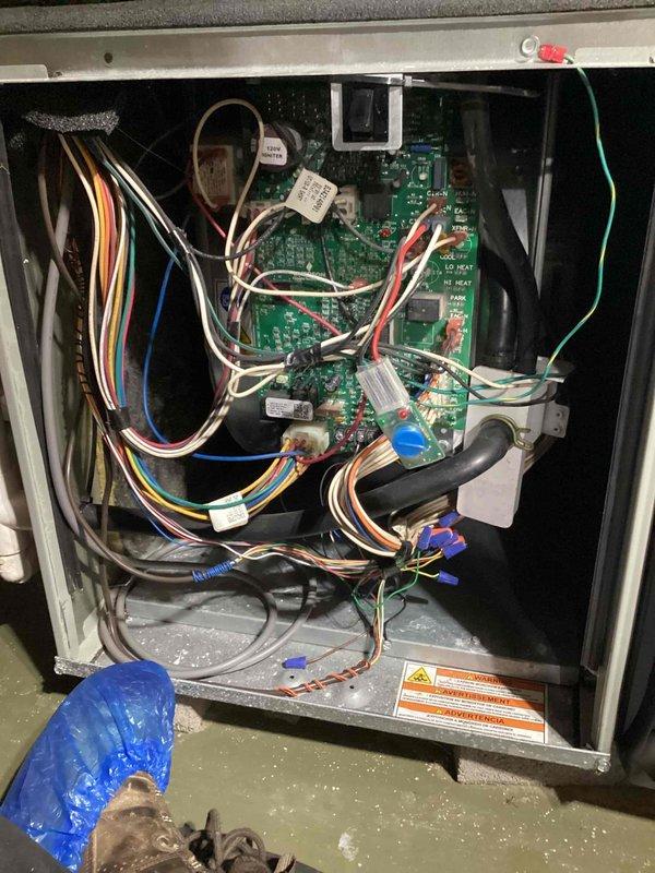 Performed comprehensive 10-year furnace maintenance service including inspection of electronic control panel circuitry and wire harness connections. Examined system safety components and verified proper operation of the PVC exhaust venting network. All components were found to be functioning correctly with no immediate service concerns identified.