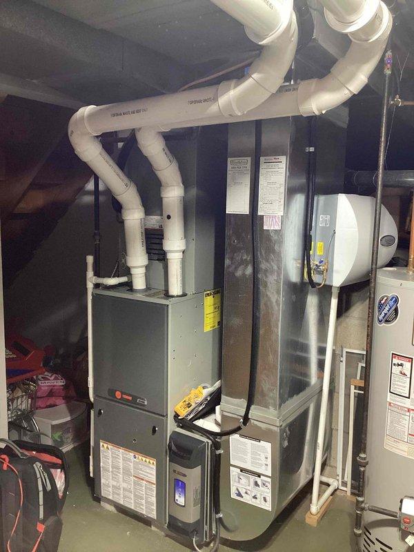 Performed comprehensive 10-year furnace maintenance service including inspection of electronic control panel circuitry and wire harness connections. Examined system safety components and verified proper operation of the PVC exhaust venting network. All components were found to be functioning correctly with no immediate service concerns identified.