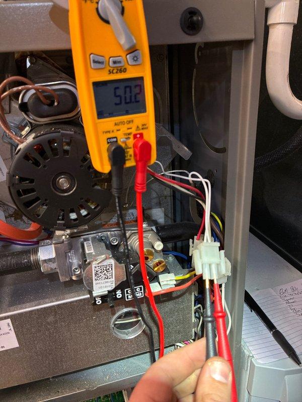 Performed routine heating maintenance on 6-year-old Lennox system. Conducted electrical testing using Fieldpiece SC260 multimeter, confirming proper voltage readings of 5.02. System functioning correctly after comprehensive tune-up service.