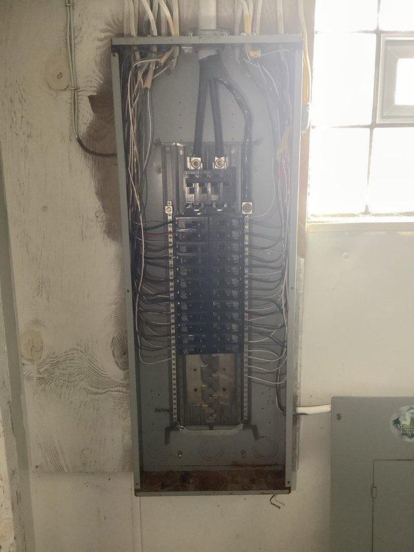 Responded to service call for kitchen outlet inspection and furnace breaker evaluation. Upon inspection of the electrical panel, found all circuit breakers properly connected with organized wiring distribution. Verified furnace breaker functionality and tested kitchen outlets to ensure proper operation and electrical load capacity.