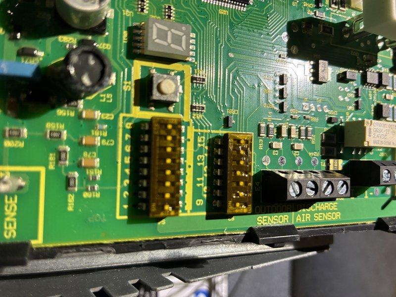 Performed scheduled furnace tune-up, inspecting control board circuitry and connections. Examined humidifier components, noting mineral deposits on housing surface. Verified proper operation of sensors and electronic controls with all connections secure.