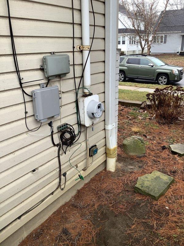 Performed inspection of customer's electrical panel for potential replacement. Examined exterior utility connections including main electrical meter and associated wiring. Additional assessment included inspection of interior electrical components related to fireplace installation, verifying proper conduit placement and connection integrity.