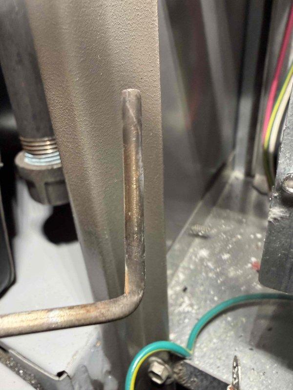 Performed routine maintenance visit on furnace system. Discovered signs of overheating at electrical terminal connections with visible heat discoloration on metal components. Identified and documented corrosion on heat exchanger tubing that will require monitoring during future service visits.