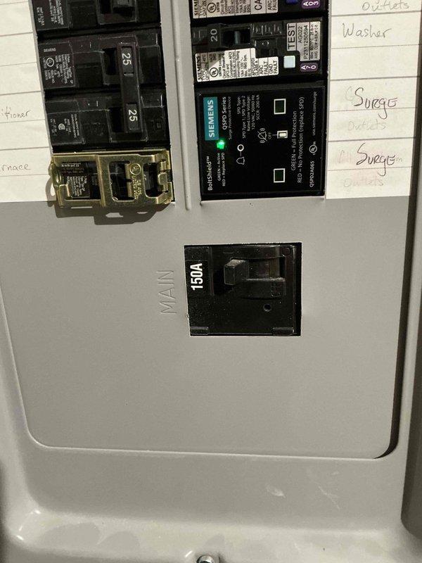 Performed generator estimate assessment with lead technician. Inspected existing electrical panels, documenting current circuit configuration and load distribution. Evaluated main 150A service panel with properly labeled circuits and identified available capacity for generator integration.
