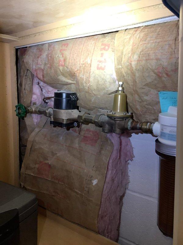 Completed installation of new city water softener system, replacing existing unit and reworking piping to accommodate the new CARB/Mineral Combo softener. Work included removing old softener, modifying plumbing connections with proper insulation around pipes, and providing six bags of salt for system operation.