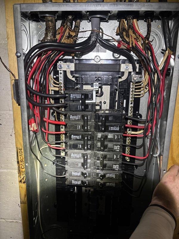 Installed emergency disconnect switch for main electrical panel to resolve failed inspection issue. Existing panel wiring was assessed and new disconnect was properly connected according to code requirements, ensuring the installation meets safety standards and addresses the inspection exception item.