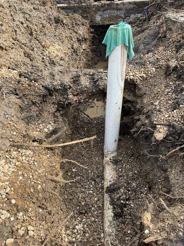 Replaced bathtub waste and overflow assembly including installation of new P-trap. Excavated access trench to expose drain pipes, allowing proper connection of the new components. Installed and secured all fittings, ensuring proper drainage and no leaks upon completion.