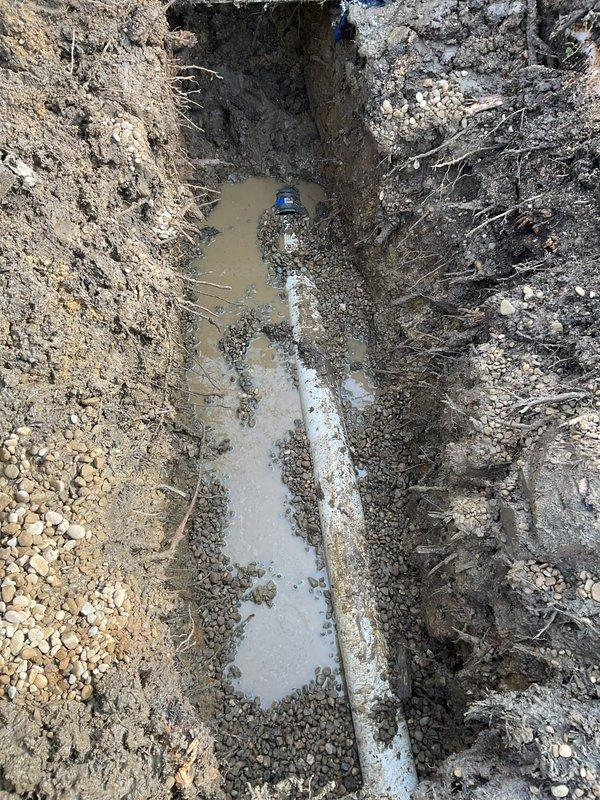 Replaced bathtub waste and overflow assembly including installation of new P-trap. Excavated access trench to expose drain pipes, allowing proper connection of the new components. Installed and secured all fittings, ensuring proper drainage and no leaks upon completion.