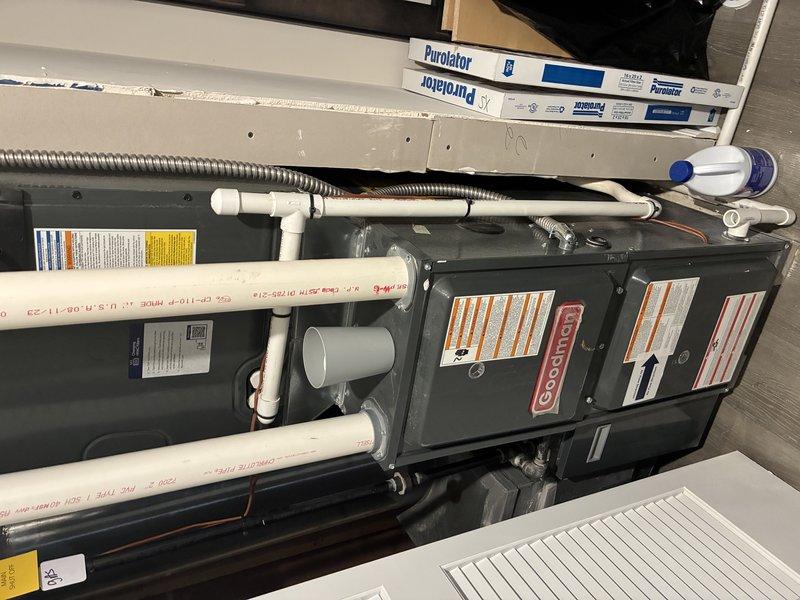 Performed standard maintenance on 10+ year old Goodman gas furnace. Inspected burner assembly, heat exchanger, and PVC ventilation system for proper operation. System was found to be functioning within normal parameters with all components properly installed and no signs of corrosion or abnormal wear.