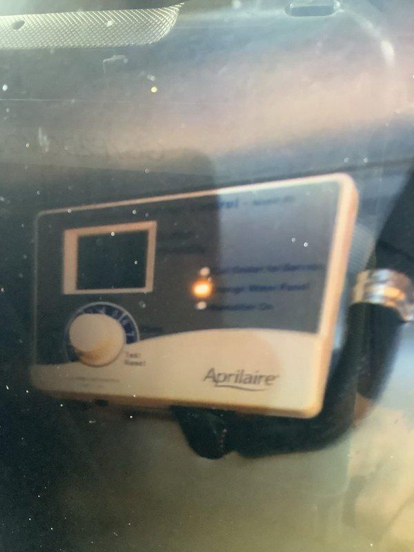 Performed comprehensive furnace tune-up including system inspection and operational testing. Evaluated Aprilaire humidity control system functionality and verified proper settings. Conducted gas pressure measurement with UEI EM201B digital manometer (reading 3.123) to ensure optimal combustion efficiency. Also inspected ductwork to assess cleaning requirements.