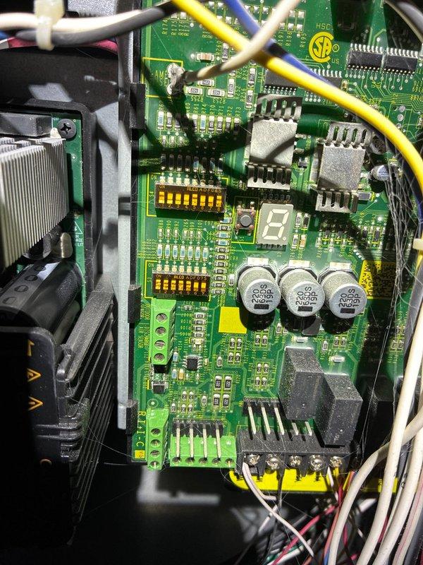 Performed scheduled MVP maintenance on Lennox furnace system. Inspected control board components including capacitors, integrated circuits, and terminal connections, with system displaying normal operation (control board showing "7" on LED display). Visual inspection confirmed proper installation of PVC venting, condensate drainage, and ductwork connections with all components in good working condition.