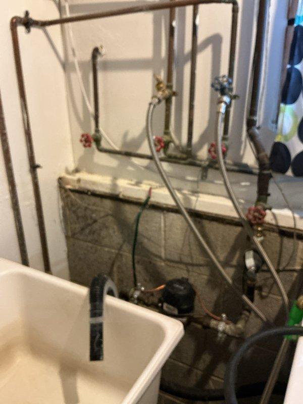 Performed routine maintenance service on a 9-year-old tanked water heater that was producing popping noises. Completed a full system flush to remove sediment buildup from tank bottom, inspected all connections and valves for proper operation, and verified proper function of temperature/pressure relief valve. System now operating normally with no unusual sounds.