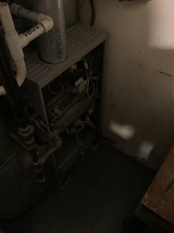Responded to no heat call for a 5-year-old residential furnace. Discovered significant frost buildup on evaporator coil causing system failure. Completed defrost cycle, cleaned coil surfaces, and restored proper system operation with successful heating function verification.