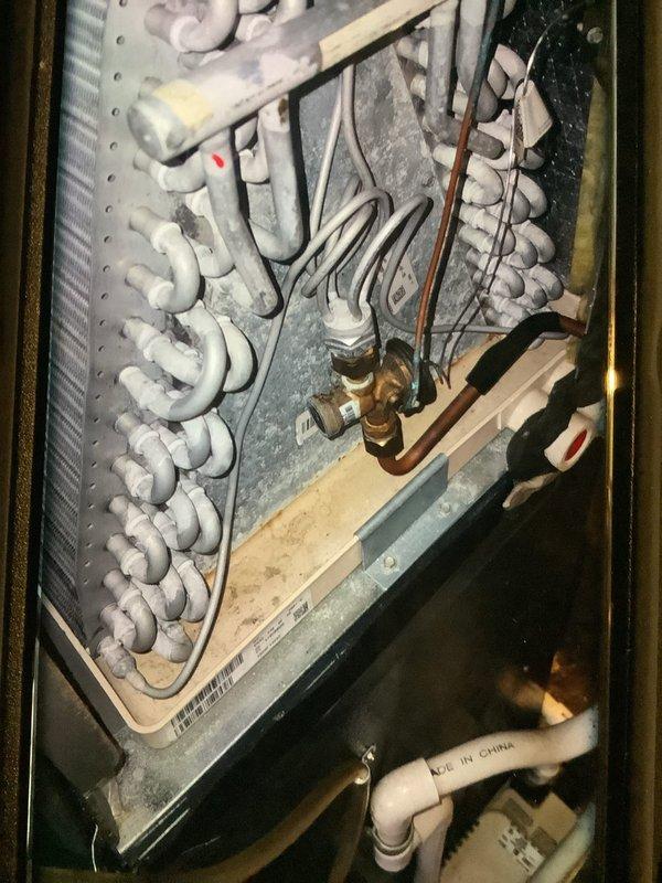 Completed bi-system MVP heating maintenance service. Inspected interior components of both units, noting normal wear on blower motors and wiring connections. Discovered significant frost accumulation on evaporator coils in second system, indicating potential refrigerant flow restriction; cleared ice buildup and restored proper operation.