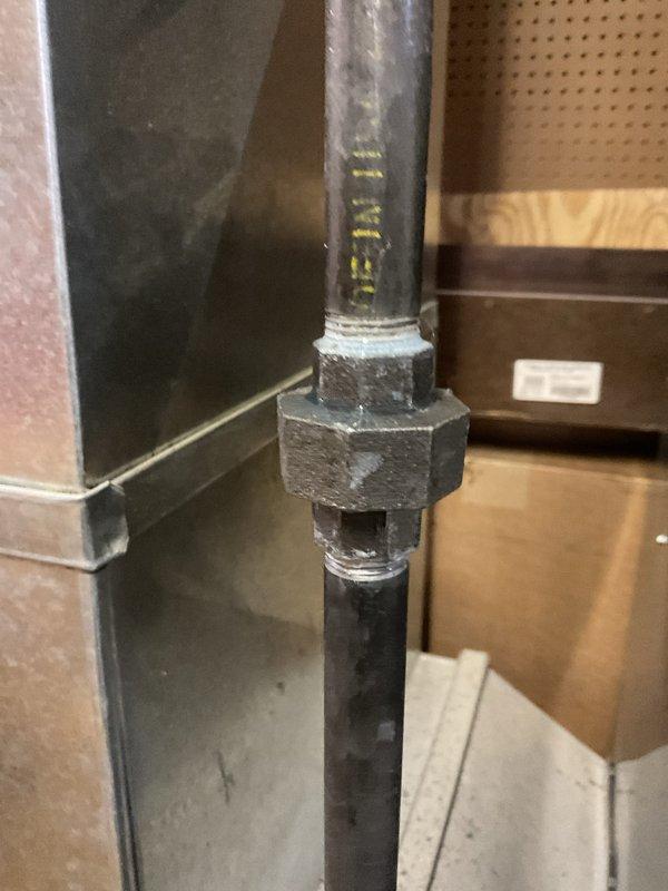 Performed scheduled MVP Heating maintenance service on two units that had been previously rescheduled due to storm. Inspected gas line connections and utilized hex key to adjust components as needed. Verified integrity of pipe junctions and fittings in the mechanical room, noting normal wear consistent with system age.