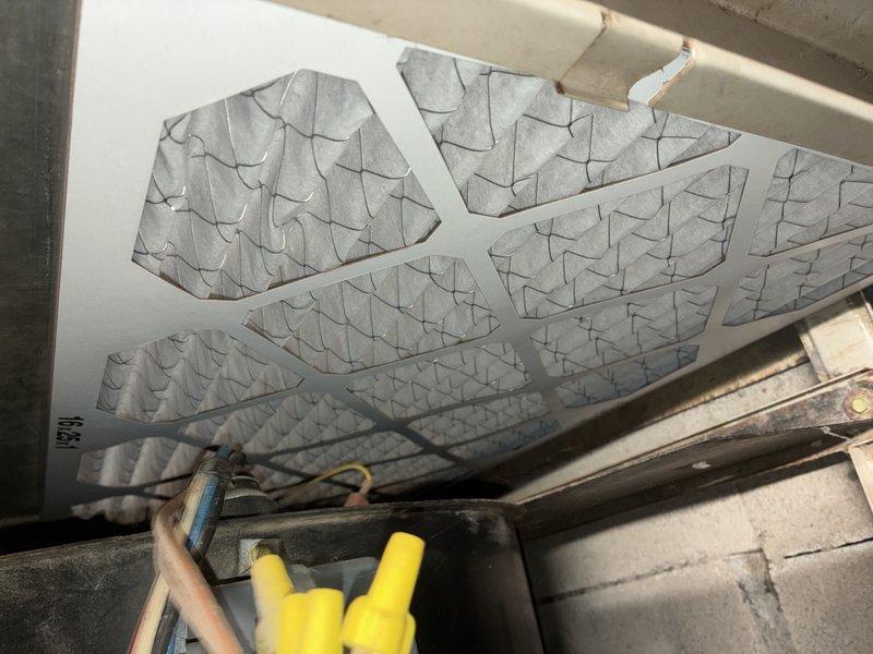 Performed scheduled heating maintenance visit on residential HVAC system. Inspected air filter housing and confirmed filter is properly installed with no visible damage. Examined gas valve and copper supply lines for proper operation and signs of leakage; all components functioning normally with no issues detected.