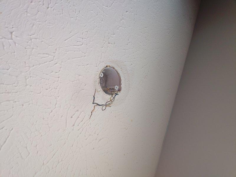 Replaced damaged ceiling junction box where a broken mounting bolt prevented installation of new light fixture. Removed old box, installed new compatible unit, and secured proper electrical connections to ensure safe fixture mounting.