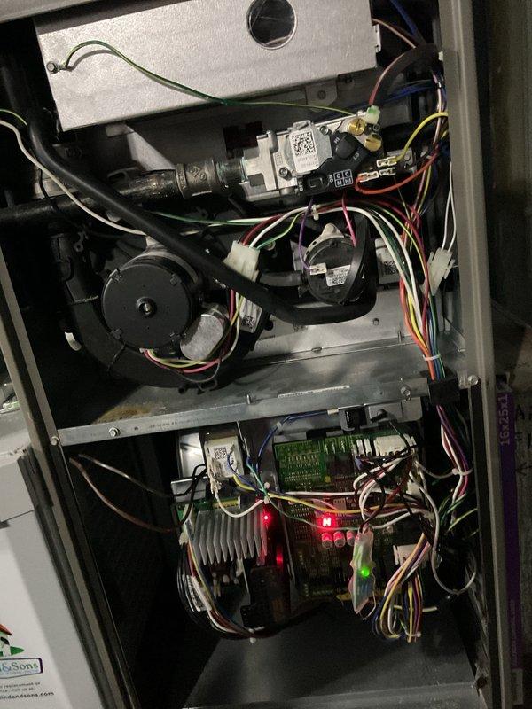 Performed scheduled maintenance on 6-year-old furnace. Accessed interior components, inspected gas valve assembly, blower motor, and control board with illuminated LEDs. Completed comprehensive heating system evaluation using appropriate tools to ensure optimal operation for the heating season.
