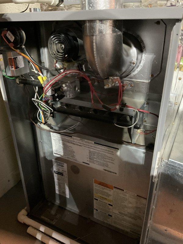Performed routine maintenance on gas furnace (approximately 6+ years old). Inspected blower assembly, electrical connections, and gas valve functionality. Evaluated ductwork condition and recommended cleaning service; system is currently operating within normal parameters.