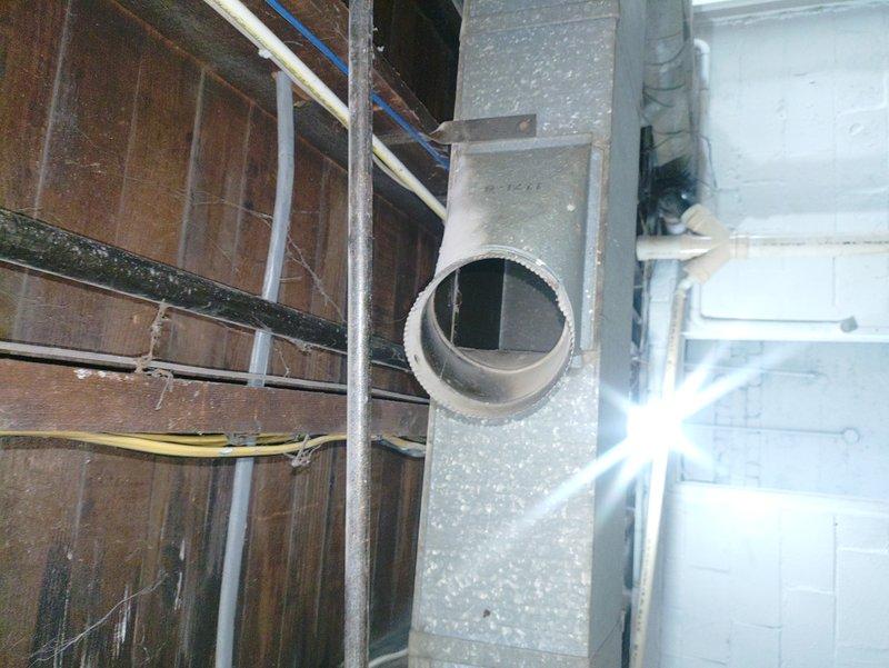 Conducted inspection of furnace and identified significant ductwork issues, including damaged circular connection point in mechanical space and deteriorated wall structures surrounding HVAC components. Documented conditions with photographs for comprehensive assessment of necessary repairs to restore proper system functionality.