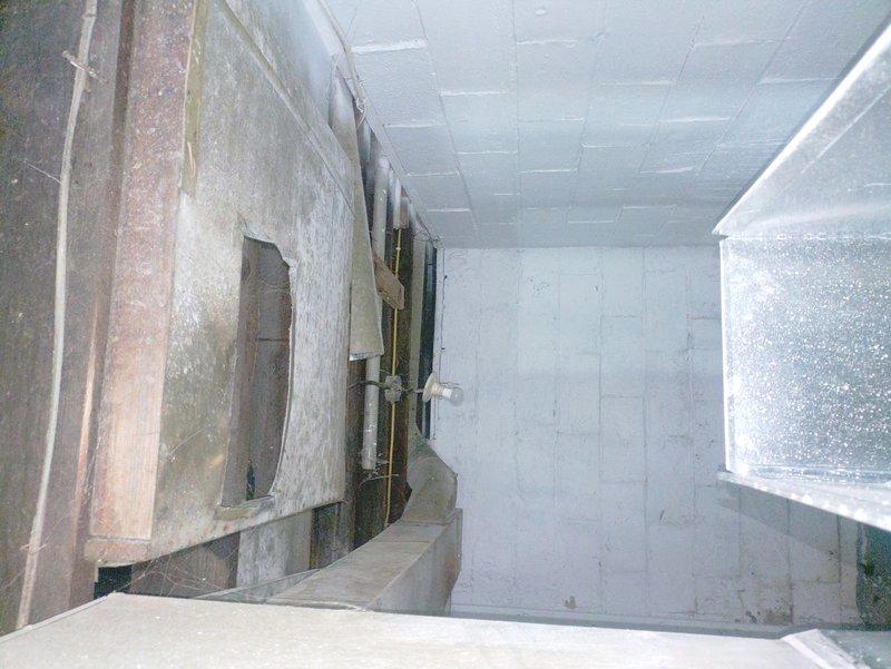 Conducted inspection of furnace and identified significant ductwork issues, including damaged circular connection point in mechanical space and deteriorated wall structures surrounding HVAC components. Documented conditions with photographs for comprehensive assessment of necessary repairs to restore proper system functionality.
