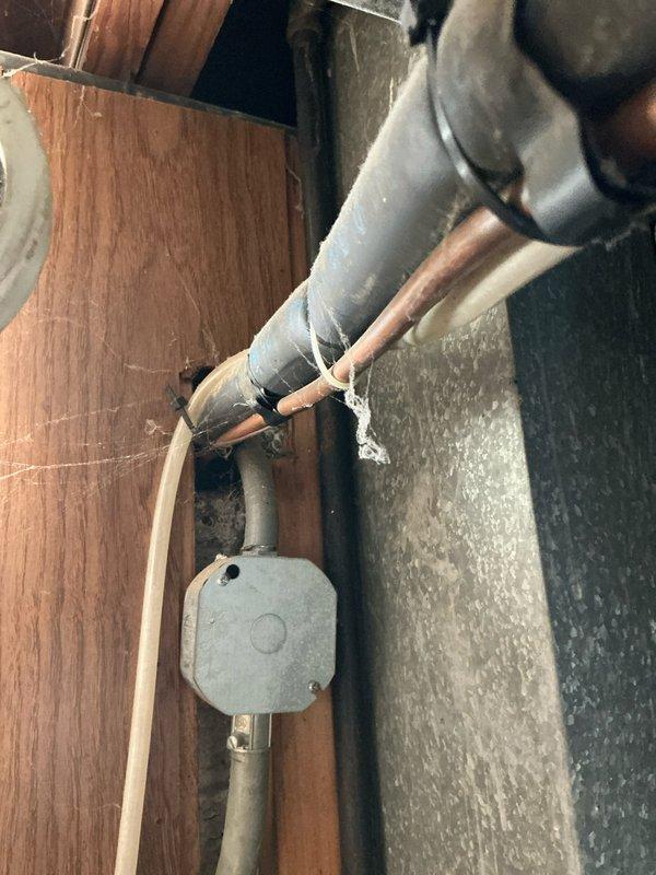 Completed assessment of 17-year-old furnace and hot water tank for potential replacement. Inspection revealed aging copper pipes with deteriorated sealing material, galvanized steel ductwork with significant dust accumulation, and signs of water damage on surrounding concrete walls. Recommended replacement with new MVP system based on observed wear and deterioration of existing components.