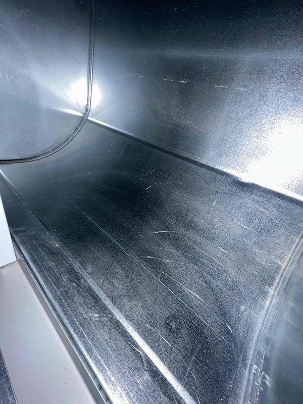 Performed comprehensive duct cleaning service on residential HVAC system, removing accumulated dust and debris from the air distribution network. Inspection revealed moderate dust accumulation and surface scratches within the main metal ductwork, which was thoroughly cleaned to improve system efficiency and indoor air quality.