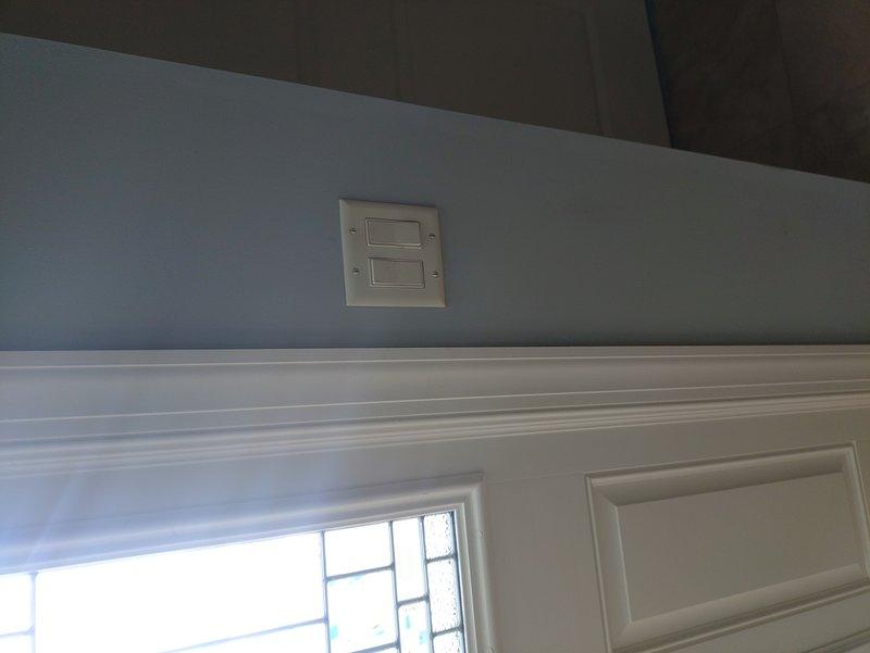 Diagnosed exterior light fixture issues reported by customer. Located faulty wiring connections at interior light switch that controlled outdoor fixtures. Repaired connections and verified proper operation of exterior circular wall-mounted light fixture.