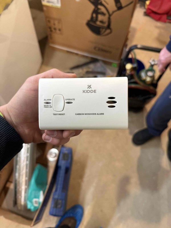 Completed installation of 80% furnace and air conditioning system with proper ductwork connections and PVC condensate drainage. Installed and tested Kidde carbon monoxide alarm as part of safety protocol. System was mounted securely against basement wall with all connections verified for proper operation.
