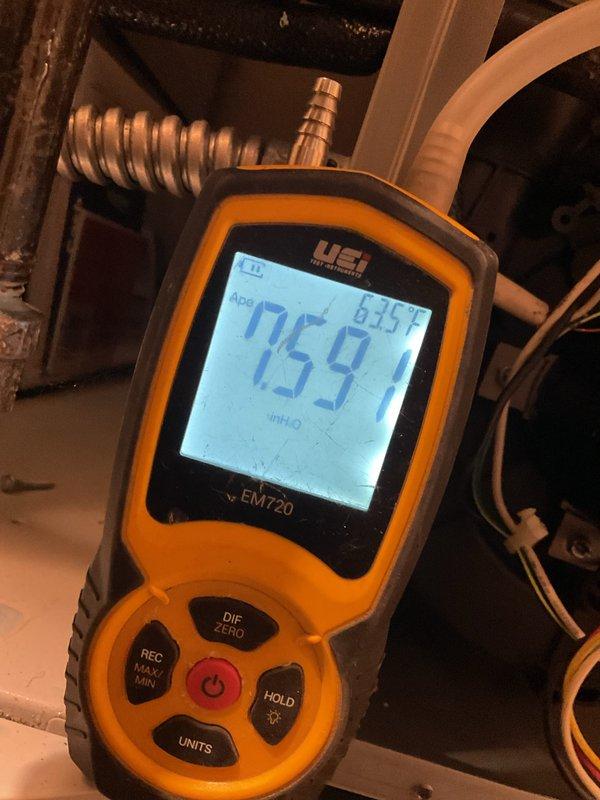 Performed routine heating system maintenance on 2-year-old unit. Replaced air filter and water panel, added water treatment tablets, and conducted diagnostic testing using UEi EM720 tool which showed satisfactory ADP readings of 159.1 and static pressure measurements of 1148.