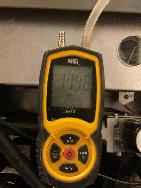 Performed routine heating system maintenance on 2-year-old unit. Replaced air filter and water panel, added water treatment tablets, and conducted diagnostic testing using UEi EM720 tool which showed satisfactory ADP readings of 159.1 and static pressure measurements of 1148.