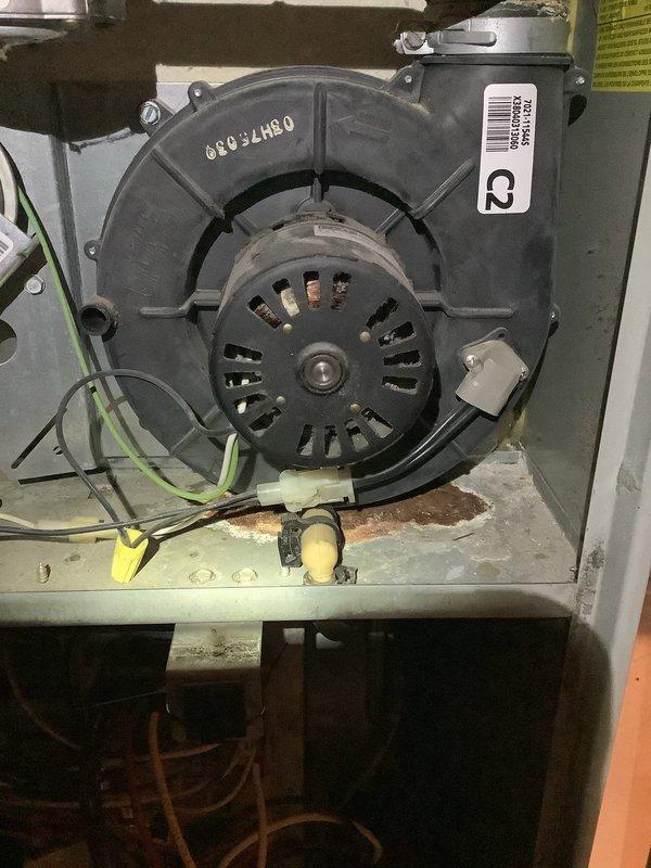 Responded to emergency no-heat call for a 25-year-old furnace showing signs of wear and corrosion. Upon inspection of the blower motor assembly and electrical control panel, diagnosed and replaced failing components, restoring proper heating function to this aging system.