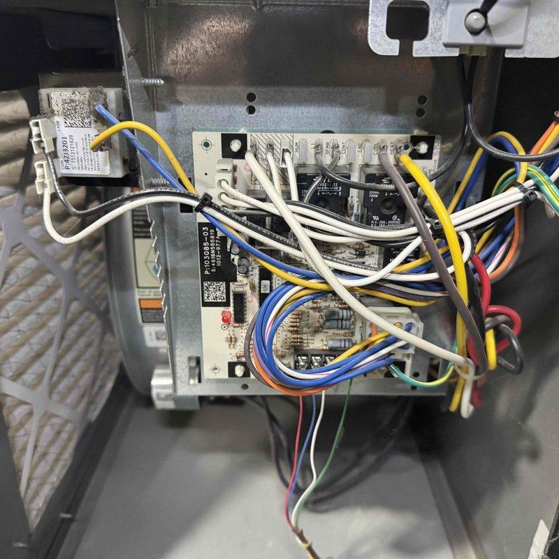 Responded to no-heat call for 5-year-old system that was cutting off and failing to restart automatically. Inspection revealed corrosion on the exhaust vent connection and diagnosed faulty control board with compromised wire connections. Replaced control board, secured all wiring connections, and cleaned corroded vent fitting to restore proper system operation.