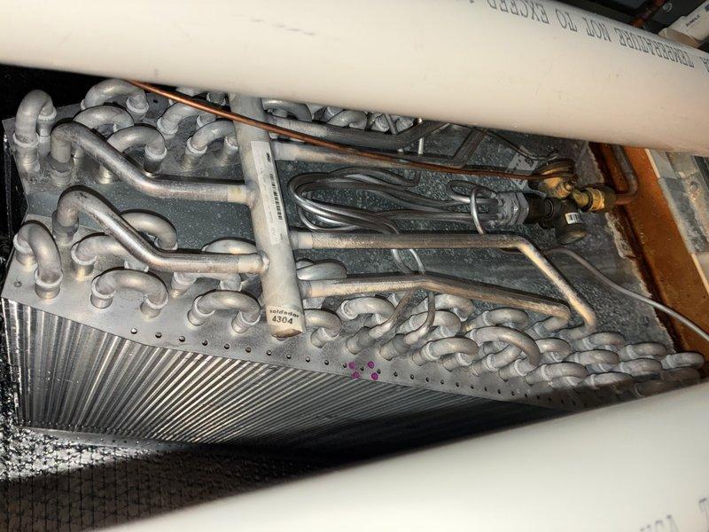 Performed diagnostic evaluation on non-functioning heating system after customer received ecobee notification about possible furnace malfunction. Inspected ventilation components and evaporator coil assembly, noting dust accumulation on vent surfaces. Completed bi-annual maintenance service on 5-year-old Bradford White system with MVP expiration in 2025, and discussed establishing regular maintenance schedule with customer.