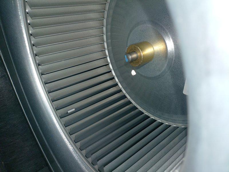 Performed scheduled furnace tune-up service. Inspected blower wheel assembly for proper operation and cleanliness, confirming good condition with no obstructions. Replaced air filter with new unit and verified proper installation in housing frame.