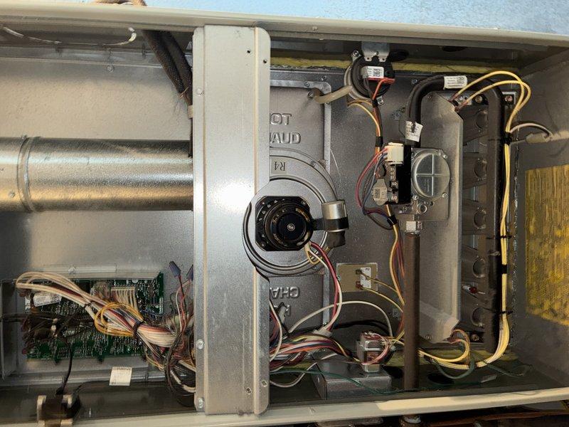 Performed comprehensive furnace tune-up, inspecting blower motor assembly and electrical connections on control board. Examined heat exchanger, finding slight accumulation of debris between fins with minor deformation in several sections; cleaned and restored optimal airflow for improved system efficiency.