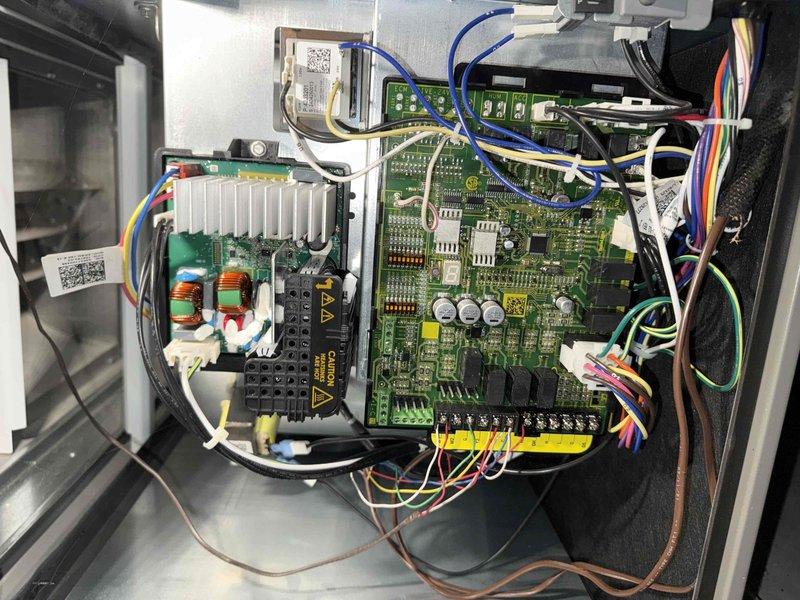 Performed routine furnace maintenance including inspection of control board circuitry. Examined DIP switch settings on ALCO ADF08S and ADF07S arrays and verified proper configuration. Inspected power supply module, terminal connections, and wiring harness for proper routing and secure connections, with all components found in good working condition.