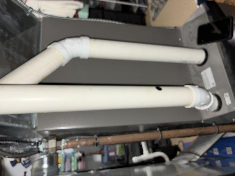 Performed annual heating maintenance on furnace with Aprilaire humidifier system. Inspected intake and exhaust PVC venting, confirming proper installation and connections. System is functioning correctly with no operational issues identified.