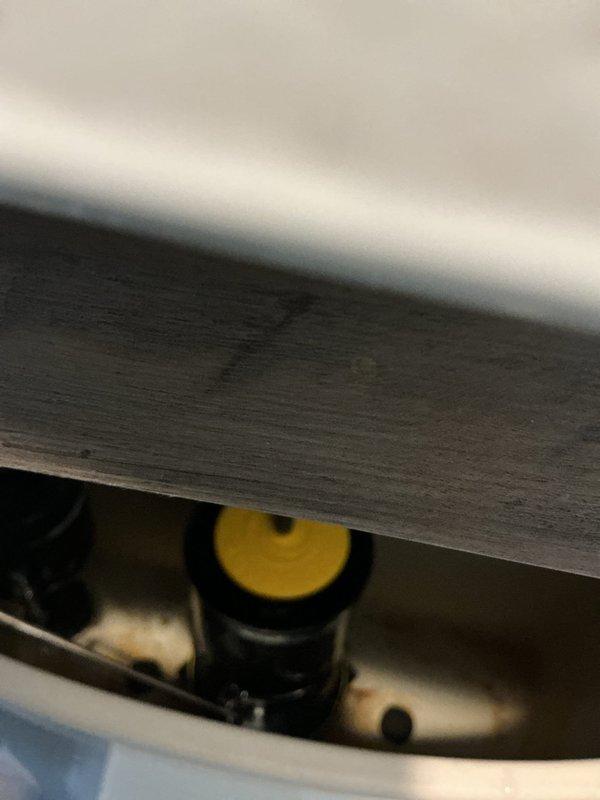 Diagnosed and repaired toilet with intermittent running issue by replacing worn flapper valve and adjusting fill valve mechanism. Cleaned mineral deposits from valve seat and verified proper water level after repair, ensuring complete elimination of phantom flushing condition.