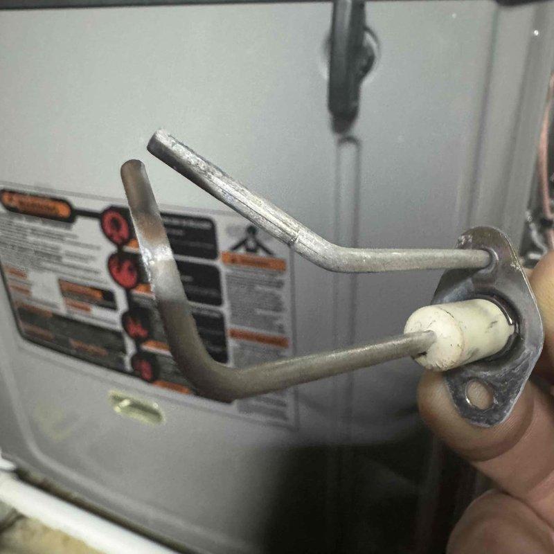 Diagnosed and reset furnace lockout code that was preventing gas ignition. Inspected and removed blower wheel assembly for evaluation. Examined and replaced damaged igniter assembly, which was causing the thermostat to repeatedly call for heat without successful ignition.