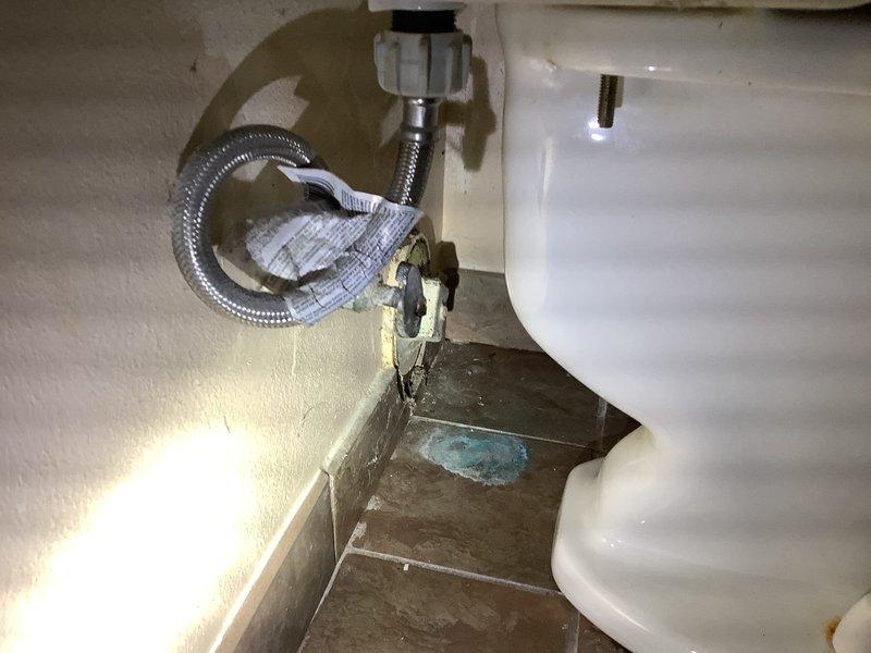 Responded to a service call for a clogged drain in a residential property. Inspected the toilet system, which showed significant mineral buildup and discoloration in the tank, indicating hard water issues contributing to the clog. Successfully cleared the obstruction in the drain line and performed preventative maintenance on the toilet's supply line connection to prevent future issues.