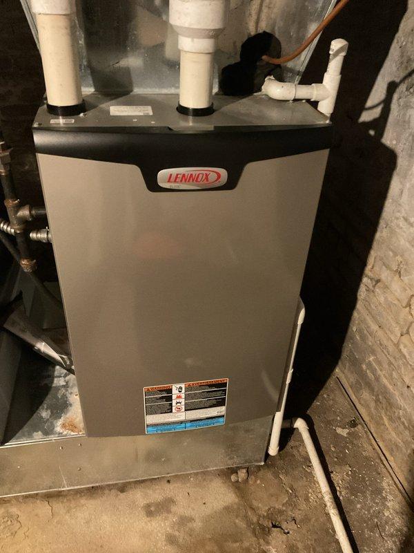 Performed scheduled tune-up on 5-year-old Lennox furnace. Inspected burner assembly through sight glass, checked heat exchanger integrity, and verified proper venting through PVC exhaust system. Unit is operating within manufacturer specifications with no issues detected.